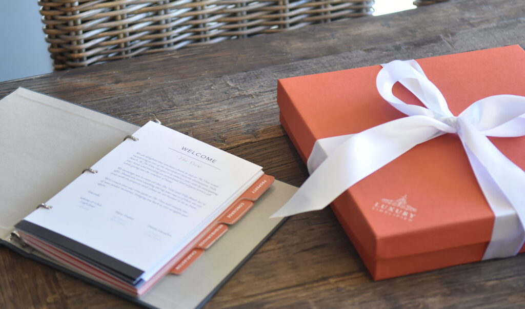 Orange Welcome Box tied with Ribbon