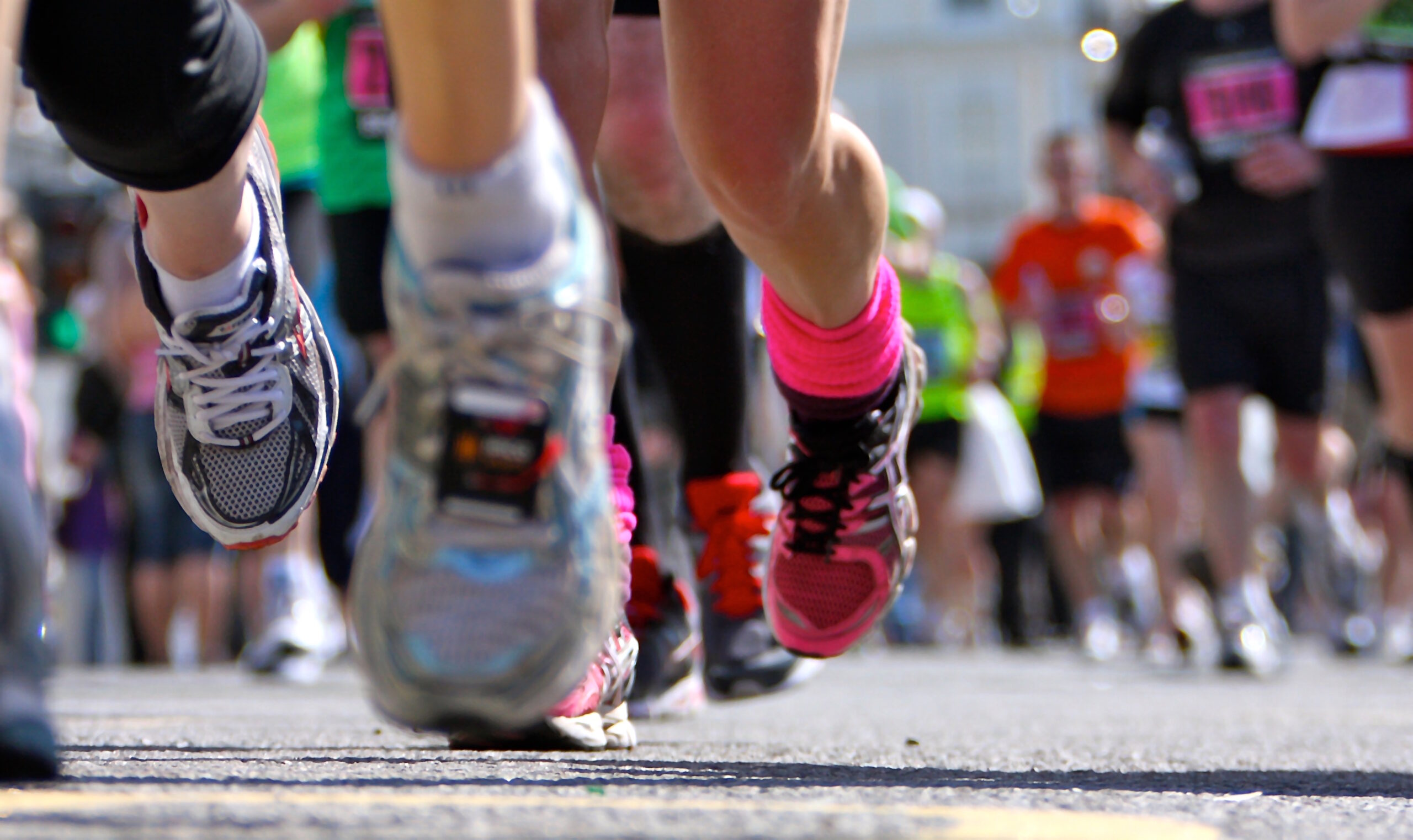 Runners taking part in the Hilton Head Marathon. Close up of feet and shoes