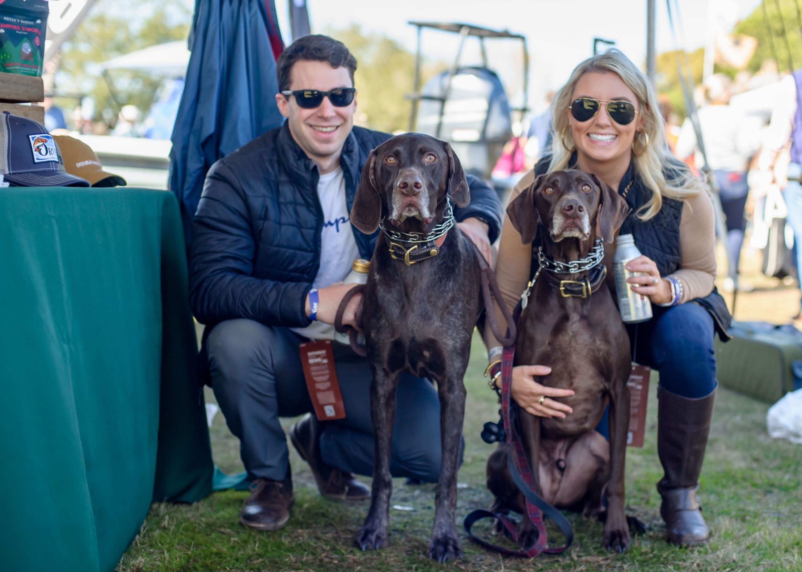 patrons enjoying SEWE festival and german shorthair pointers